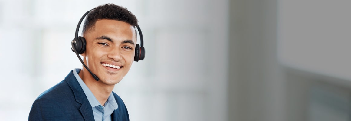 Man looking at us and smiling