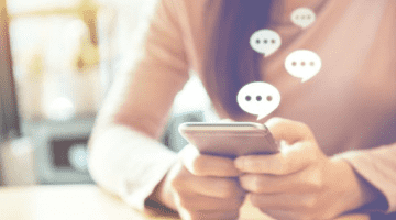 Person writing on a lawyer desk
