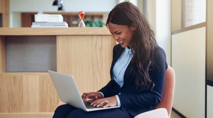 Person writing on a lawyer desk
